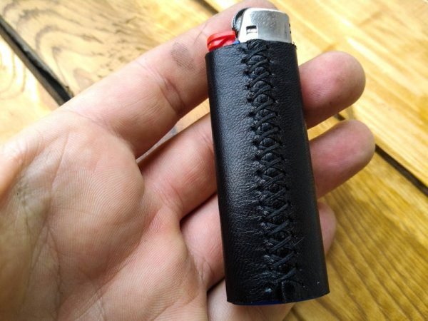 Refillable lighter with black leather sleeve - Image 3